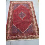 A hand knotted woollen Aarak rug, 2.00m x 1.30m, in good condition