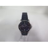 A Victorinox quartz stainless steel wristwatch on plastic strap, 34mm case, revolving bezel with