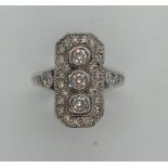 An 18ct white gold Art Deco vintage style diamond ring, size approx P, marked 750, head approx