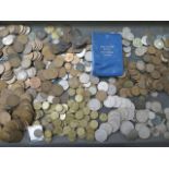 A collection of assorted coins, mainly British