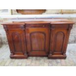 A good quality mahogany breakfront sideboard with two frieze drawers and three cupboard doors