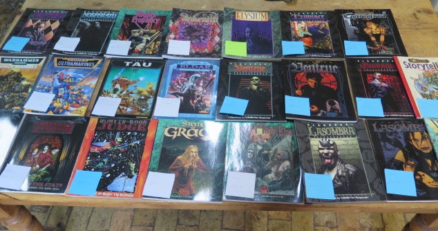 A collection of 20 paperback fantasy gaming source books and Warhammer Codex, all good,