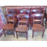 A set of 6 19th Century mahogany dining chairs with solid seats , small damage to one seat otherwise