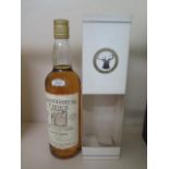 A 70cl bottle of Connoisseurs Choice single Highland malt whisky distilled at Knockdhu 1974
