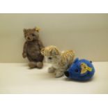 Three Steiff toys; a Steiff cosy felt blue mouse 5390/15, button and label intact; a Steiff small