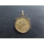 A Victorian gold full sovereign in a hallmarked 9ct pendant mount, total weight approx 9.5 grams