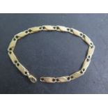 An 18ct yellow gold bracelet, 21cm long marked 750, approx 14.9 grams generally good, clasp good