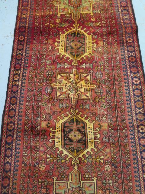 A hand knotted woollen Karajeh rug, 2.40m x 1.15m, in good condition - Image 2 of 3