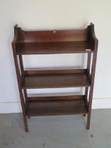 A small oak bookcase 89cm tall x 56cm x 20cm
