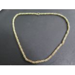 A hallmarked 9ct yellow gold necklace, 59cm long, approx 26.6 grams, in good condition