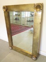 A modern gilt mirror with shell design corners, 118cm x 86cm
