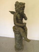 A bronze figural water feature of a fairy on a column, 135cm tall