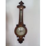 A 19th century walnut with thermometer, signed C Rimondi Halifax, 115cm tall, in good condition,
