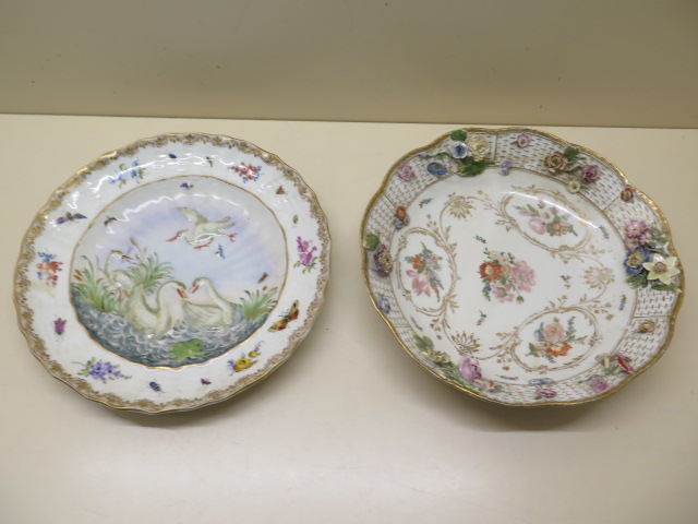 A Continental swan and heron decorated cabinet plate, 24cm diameter, and a Meissen second quality