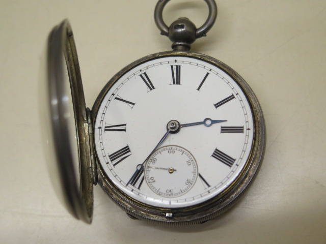 A silver pocket watch, the movement signed Richrd Rourledge, 5.5cm case, running, generally good, wi - Image 2 of 4