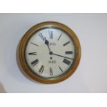 An 8 day oak case wall clock with 12" dial with fusee movement, G.P.O no:1123, movement no:2035,