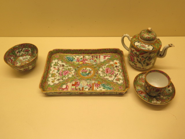 A matched famille rose Canton bachelors part tea set on tray, teapot with associated top otherwise