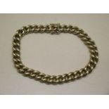 A 14ct yellow gold solid curb pattern bracelet, approx weight 38.9 grams, length 20cm x 7mm wide,