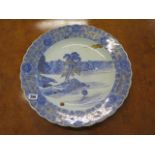 A Japanese blue and white gilt decorated wavy rim charger, 43cm diameter, in good condition