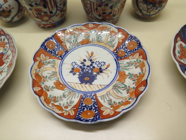 Two pairs of Imari vases, tallest 22cm and three Imari plates, all generally good minor chips to - Image 3 of 7