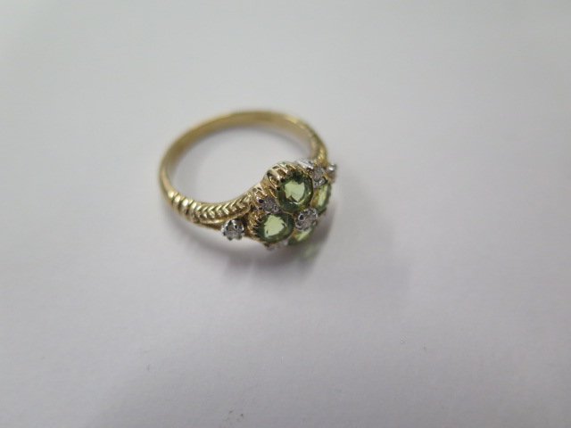 A 9ct yellow gold peridot and diamond ring, size M 1/2, hallmarked in good condition - Image 2 of 3