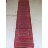 A hand knotted woollen Meshwani runner 237cm x 60cm