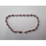 A yellow gold amethyst bracelet, 18cm long, approx 4.8 grams in good condition