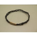 A Victorian mammal hair braided bracelet with a 9ct gold mount, 8.5cm x 8.5cm diameter, in good