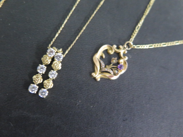 A 9ct gold pendant on chain, two broken 9ct gold chains and a 9ct chain with two 14 ct pendants, - Image 2 of 2