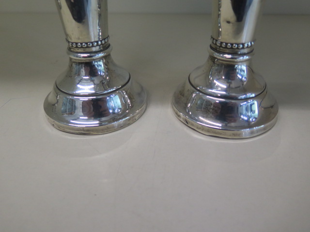 A pair of silver vases with weighted bases, 18.5cm tall, some denting and bending but nice - Image 4 of 4