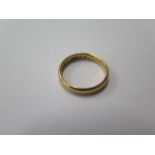 A hallmarked 22ct yellow gold band ring, size L/M, approx 3.7 grams, some marks but generally good