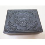 A carved Victorian jet box decorated with a pair of doves surrounded by acanthus together with a