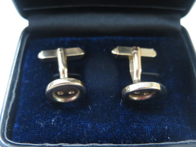 A pair of gold cufflinks, tests to approx 9ct, approx weight 13 grams, small test mark otherwise