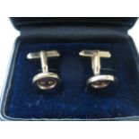 A pair of gold cufflinks, tests to approx 9ct, approx weight 13 grams, small test mark otherwise