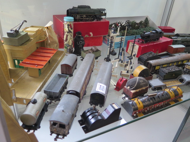 A collection of Trix rolling stock, buildings and five locos, all in play worn condition