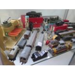 A collection of Trix rolling stock, buildings and five locos, all in play worn condition