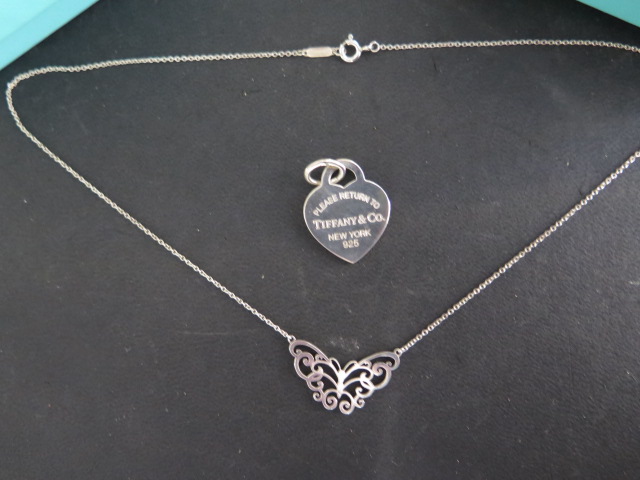 A Tiffany & Co silver heart pendant and a Tiffany butterfly necklace, 40cm long, both with boxes and - Image 2 of 2