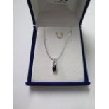 An 18ct white gold sapphire pendant on an 18ct white gold 44cm chain, total weight approx 2.4 grams,