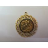 A George V gold full sovereign dated 1913 in a hallmarked 9ct gold pendant mount, total weight