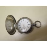 A silver cased Dent & Sons hunter pocket watch, 5cm case, in running order, some wear / dents to
