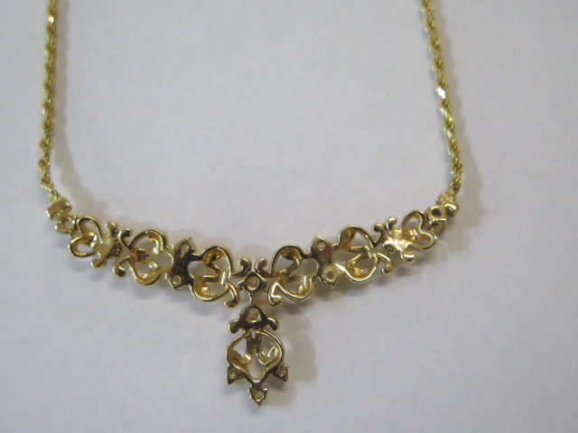 A hallmarked 18ct yellow gold necklet, approx 16.2 grams, length approx 43cm, fitted with a - Image 4 of 4