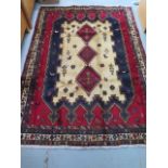 A hand knotted woollen Afshar rug, 2.45m x 1.80m, some small marks and stains