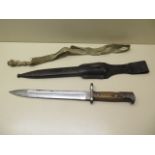A German knife bayonet with scabbard and Troddel, the blade marked Weyersberg Kirschbaum & Co