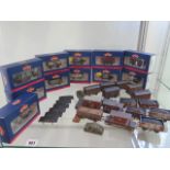 A collection of Hornby and Bachmann rolling stock, 11 with boxes, all have been lightly weathered