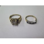 A 14ct CZ ring, size M, approx weight 4.7 grams and a 9ct seven stone ring, size K, approx weight