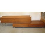 A teak effect four drawer sideboard TV unit adjustable in length, 71cm tall x 61cm deep