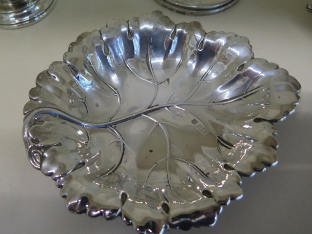 A silver leaf dish, a silver sugar bowl, a Mappin and Webb silver shaker 6cm tall and a glass vase - Image 2 of 7