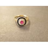 A 9ct yellow gold ruby, diamond and onyx ring, size P 1/2 by Luke Stokley, head approx 11mm,