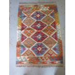 A hand knotted woollen Chobi Kilim, 121cm x 80cm