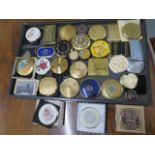A collection of 32 compacts